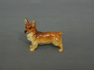 A Royal Doulton figure Royal Corgi K16 2" long