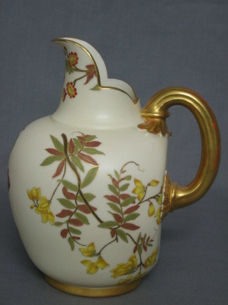 A Royal Worcester blush ivory ground jug with gilt handle, base marked 1094 7 1/2"