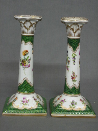 A pair of late Dresden square porcelain candlesticks with floral decoration 7"