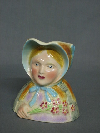 An Avonware jug in the form of Little Nell 4" (cracked)