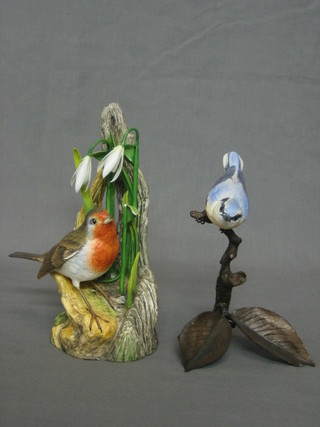 A Boneham figure of a Robin with snow drops 8" and an Albany figure of a Nut Hatch raised on a bronze base 6"