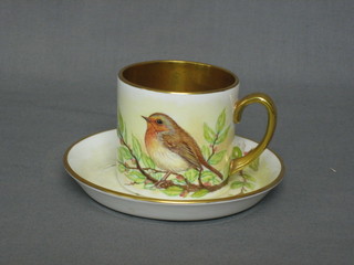 Leighton Maybury, a porcelain cup and saucer decorated a robin