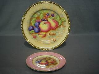 An Aynsley porcelain plate decorated fruit, the reverse marked 7964 10" and an Aynsley tea plate decorated fruit marked 439 6"