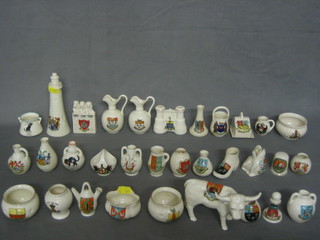 An Arcadian model of a highland bull decorated the Arms of Congleton, an Arcadian light house - Arms of Westcliff on Sea and approx. 30 other items of crested china