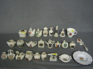 A Willow crested china model of a guitar decorated the Arms of The Sea of Healy, a Willow crested anvil - Arms of Odian, a Willow crested vase - Arms of Chichester and a Willow crested trinket box - Arms of Windsor and 22 other items of crested china