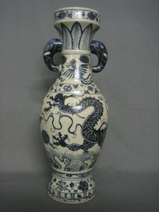 A 17th/18th Century Oriental blue and white twin handled vase with elephant handle decoration 19 1/2"
