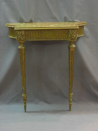 A 20th Century gilt painted console table, raised on fluted supports 29"