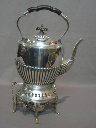 A silver plated tea kettle with demi-reeded decoration complete with burner