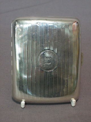 A silver cigarette case Birmingham 1922, 2 ozs