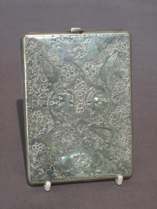 An Eastern engraved silver cigarette case 4 ozs