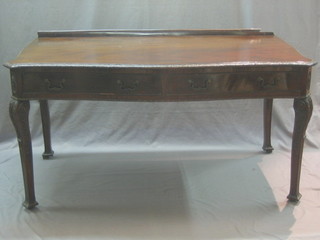 A Victorian Chippendale style handsome mahogany side table of serpentine outline, carved throughout, fitted 2 long drawers, raised on square supports 57"