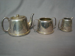 A 3 piece circular silver plated hotelware tea service comprising teapot, cream jug and sugar bowl