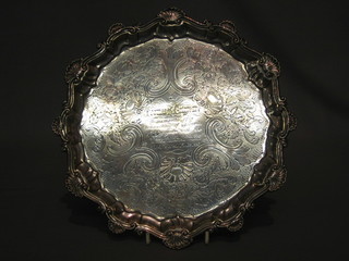 A George III silver salver with bracketed border and later engraving, raised on bun feet London 1778, 16 ozs