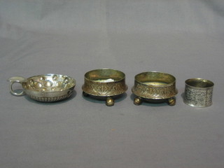 A pair of Eastern silver plated salts, a wine taster and a napkin ring