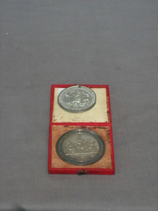 A Liverpool Musical Institute silver medal and a medal to commemorate the opening of the Northern Dock