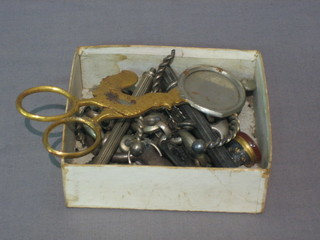 A gilt metal locket, 2 decanter labels and a small quantity of  curios