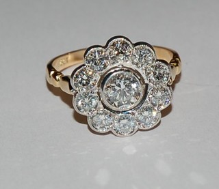 A lady's 18ct yellow gold cluster design dress ring set 11 diamonds, approx 1.85ct