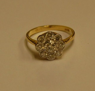 A lady's attractive 18ct yellow gold cluster design dress ring set 9 diamonds approx 1.50ct
