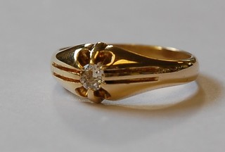 A gentleman's 18ct gold gypsy ring set a diamond