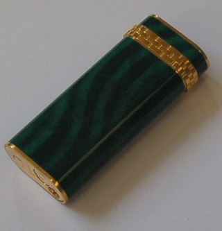 A Cartier green enamel and gold plated lighter, the base marked Cartier Paris A00513 1989
