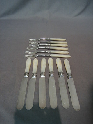 A harlequin set of 6 Victorian silver fruit knives and forks with mother of pearl handles, Sheffield 1876 and 1878