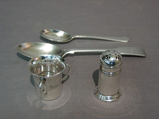 A silver 3 handled tyg, a silver pepperette, a silver fiddle pattern pudding spoon and a silver teaspoon