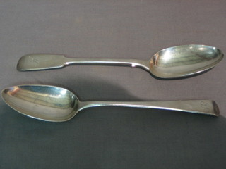 A Georgian silver Old English pattern table spoon and a Victorian silver fiddle pattern table spoon, 5 ozs