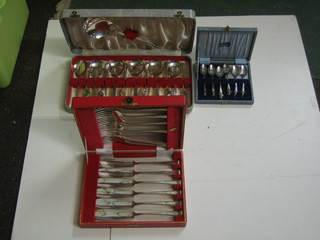 A set of 6 silver plated fruit spoons and forks, a set of 6 silver plated fish knives and forks and a set of 6 silver plated teaspoons, cased