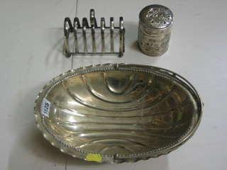 A boat shaped silver plated cake basket with swing handle 11", a 7 bar toast rack and an Eastern plated cylindrical box with lid