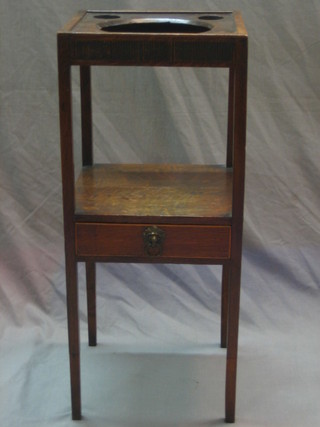 An 18th Century square oak wash stand the top fitted 3 recepticals, the base fitted a drawer and raised on square tapering supports 13"
