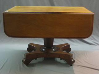 A William IV mahogany pedestal Pembroke table fitted a drawer, raised on a chamfered column with triform base 41"
