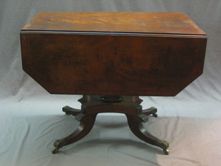 A Regency mahogany pedestal Pembroke table with 1 frieze drawer, raised on a chamfered column with triform base ending in splayed feet 36"