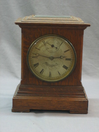 An Edwardian electric bracket clock, the 5 1/2" silvered dial with subsidiary second hand by Elliott & Romanze contained in an oak case (1 decorative moulding missing)