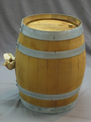 A coopered wooden barrel 17"