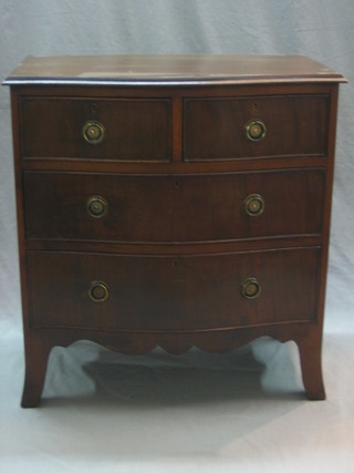 A Georgian style mahogany chest of serpentine outline fitted 2 short and 2 long drawers, raised on splayed bracket feet 29"