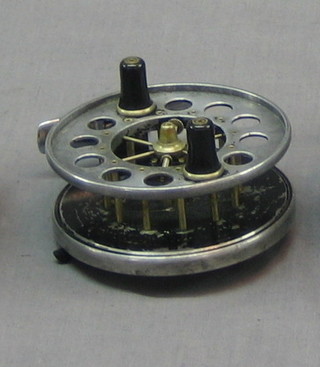 An Alcocks aerial centre pin fishing reel with 5 spokes 4"