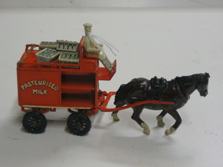 A Charbens model horse drawn milk float, complete with horse, milkman and 5 milk crates