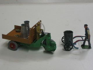 A Dinky motor car 27G together with 2 milk churns complete with lids and a water carrier and figure