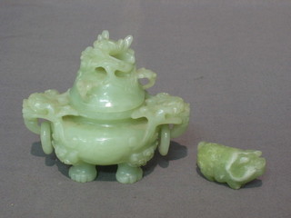 A jade coloured twin handled urn 3" and a jade coloured pig 2"