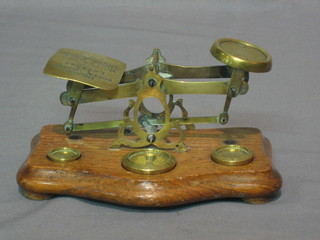 A pair of 19th Century brass letter scales complete with weights
