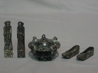 A pair of Eastern black hardstone figures of standing Sages 3", do. pair of shoes 3" and a circular jar and cover