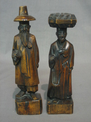 A pair of Korean carved wooden figures 8"