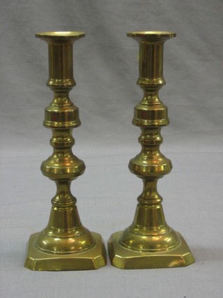 A pair of 19th Century brass candlesticks 9"