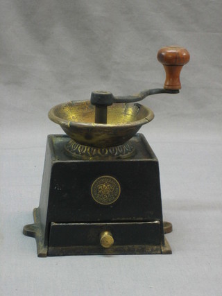 A 19th Century brass and iron coffee grinder by Archibald Kenrick & Sons