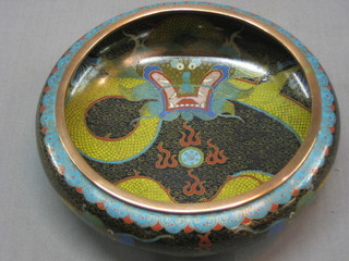 A Japanese black and floral patterned cloisonne bowl decorated a dragon 7 1/2"