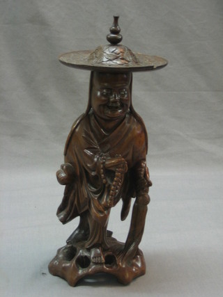 An Eastern hardwood figure of a standing sage 14"