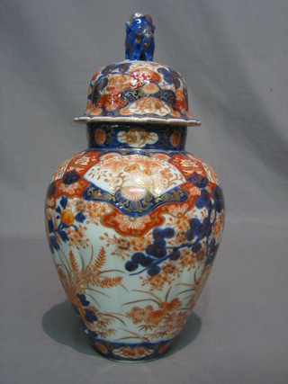 A  good 19th Century Japanese Imari urn and cover 12"