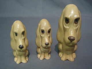 3 Sylvac brown glazed graduated figures of seated dogs 7"