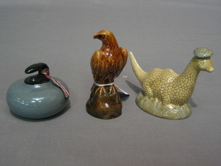A Beswick figure of an owl for Beneagles Whisky 4", do. The Loch Ness Monster and a Curling stone