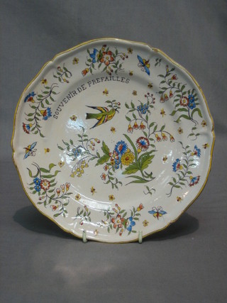 A 19th/20th Century French faience plate decorated a bird marked souvenir Dprefailles 9" (slight chips)